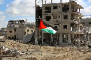 A Palestinian flag near rubble in Rafah, the Gaza Strip, January 2025