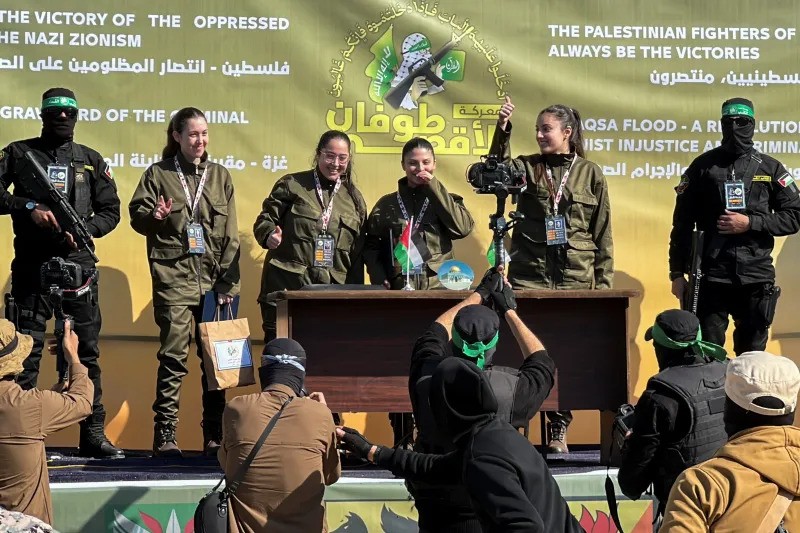 Female Israeli soldiers being released by Hamas militants, Gaza City, January 2025