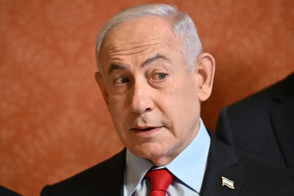 Israeli Prime Minister Benjamin Netanyahu looks on before a meeting with U.S. Senate Majority Leader John Thune, Republican from South Dakota, and other senators at the U.S. Capitol in Washington, D.C.